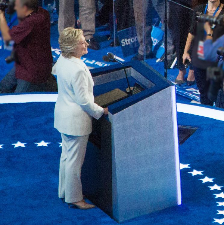 Hillary Clinton at the 2016 Democratic National Convention, wearing her all-white Ralph Lauren pantsuit