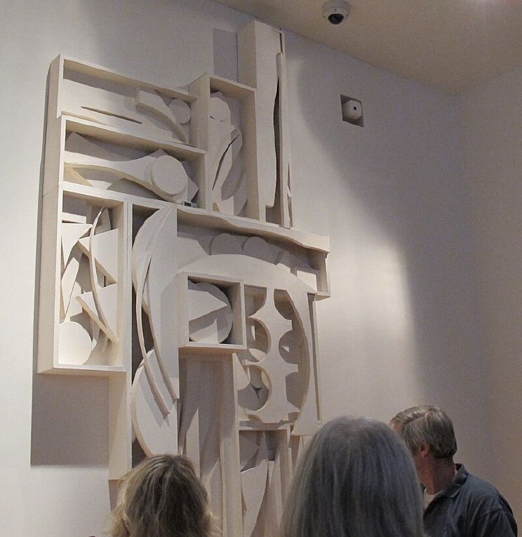 Louise Nevelson's Sky Cathedral (1982), a monumental black wooden wall sculpture